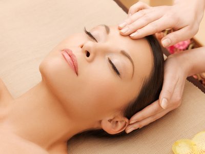 picture of happy beautiful woman in massage salon